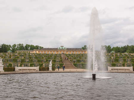 POTSDAM, GERMANY - MAY 10, 2014: Tourists visiting the baroque Schloss Sanssouci former summer palace of Frederick the Great King of Prussiaのeditorial素材
