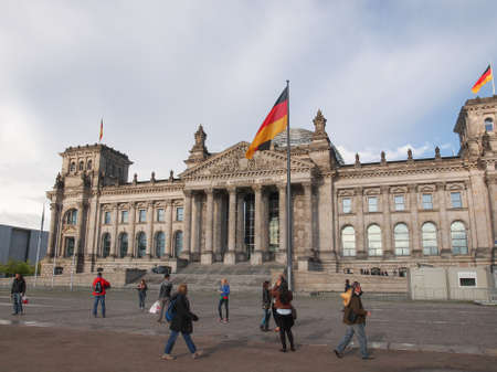 BERLIN, GERMANY - MAY 11, 2014: Tourists visiting the Reichstag (German Parliament) in Tiergarten Parkのeditorial素材
