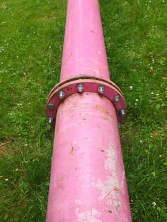 Pink water pipes in Leipzig Germany used to pump water away from buildings foundations are now a city landmarkの写真素材