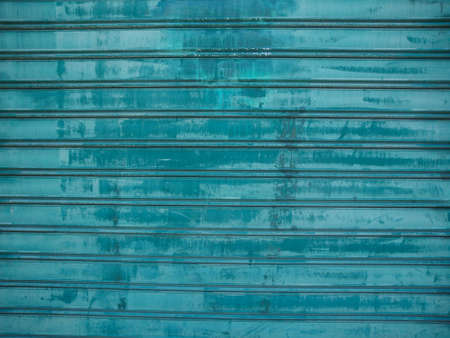 Grunge green corrugated steel plate useful as a background