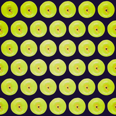 Vintage retro looking Green Granny Smith apples useful as a seamless backgroundの写真素材