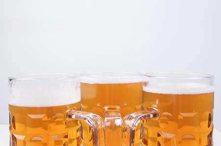 Many large glasses of German lager beerの写真素材