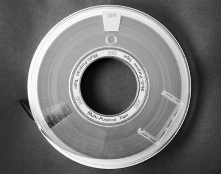 LONDON, UK - DECEMBER 31, 2014: IBM reel tape for computer data storage in black and whiteのeditorial素材