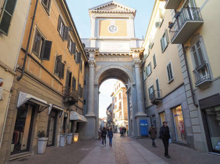 CHIERI, ITALY - JANUARY 12, 2015: Tourists visiting Via Vittorio Emanuele high street in the city centreのeditorial素材