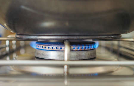 Saucepan on a gas cookerの写真素材