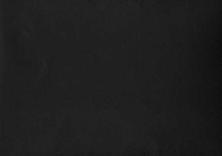 Black colour paper useful as a backgroundの写真素材