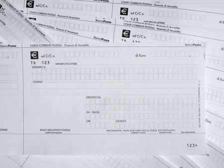 MILAN, ITALY - APRIL 2, 2015: Blank Italian postal order forms for payments, aka as Bollettino...