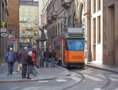 MILAN, ITALY - MARCH 28, 2015: Tourists in the Milan city centre in Italyのeditorial素材