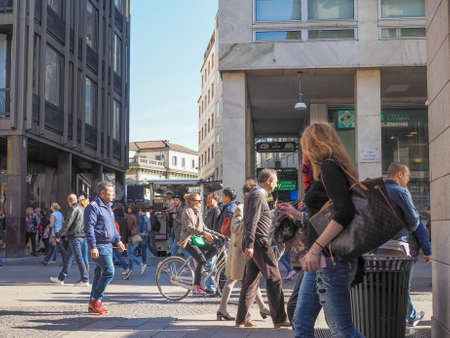 MILAN, ITALY - MARCH 28, 2015: Tourists in the Milan city centre in Italyのeditorial素材