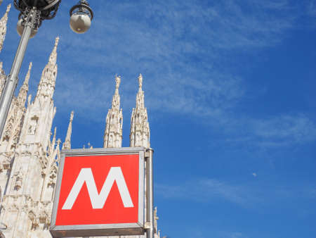 MILAN, ITALY - MARCH 28, 2015: Underground station sign in front of Milan Cathedralのeditorial素材