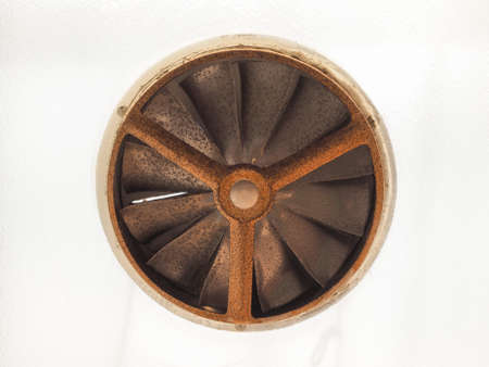 Vintage old rusted window fanの写真素材