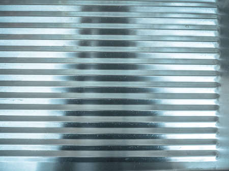 Metal steel plate useful as a background - cool cold toneの写真素材