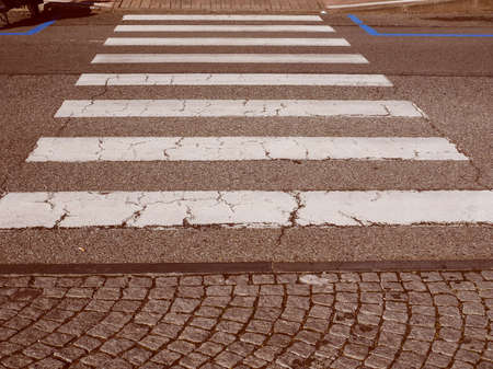Vintage looking Zebra crossing sign at pedestrian crossroadの写真素材