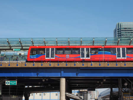 LONDON, UK - JUNE 11, 2015: The DLR meaning Docklands Light Railway links the docks redevelopment area in East London with the city centreのeditorial素材
