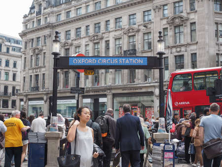 LONDON, UK - JUNE 12, 2015: Travellers at Oxford Circus underground stationのeditorial素材