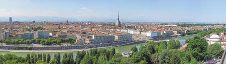 Wide panoramic aerial view of the city of Turin, Italy seen from the hillの写真素材