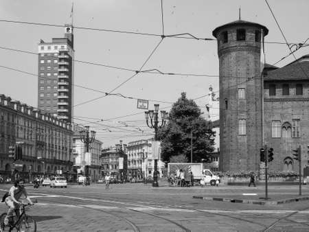 TURIN, ITALY - JUNE 19, 2015: Turists visiting the Piazza Castello central baroque square in black and whiteのeditorial素材