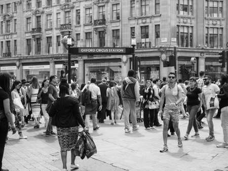 Travellers at Oxford Circus underground station in London, UK in black and whiteのeditorial素材