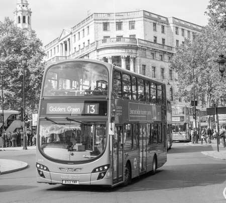 LONDON, UK - JUNE 09, 2015: Red double decker buses are a traditional landmark of London in black and whiteのeditorial素材