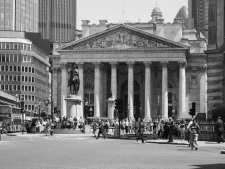 LONDON, UK - JUNE 11, 2015: People in front of The Royal Stock Exchange in black and whiteのeditorial素材
