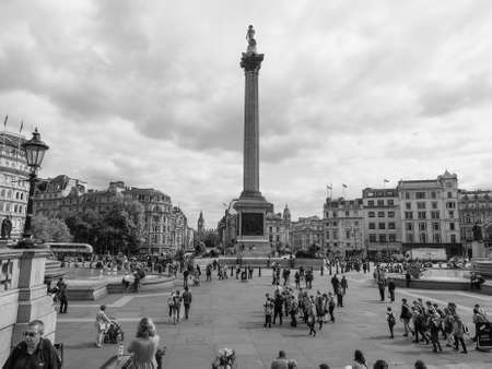 LONDON, UK - JUNE 09, 2015: Tourists visiting Trafalgar Square in black and whiteのeditorial素材