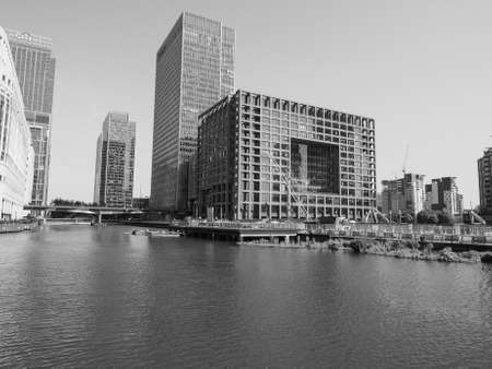 LONDON, UK - JUNE 11, 2015: The Canary Wharf business centre is the largest business district in the United Kingdom in black and whiteのeditorial素材