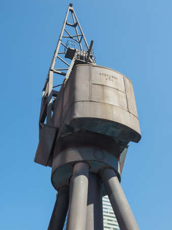 LONDON, UK - JUNE 11, 2015: Docklands harbour craneのeditorial素材