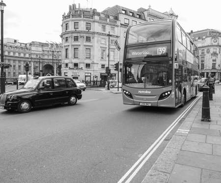 LONDON, UK - JUNE 09, 2015: Red double decker buses are a traditional landmark of London in black and whiteのeditorial素材
