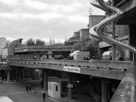 LONDON, UK - JUNE 09, 2015: People walking on the South Bank of Thames River in black and whiteのeditorial素材