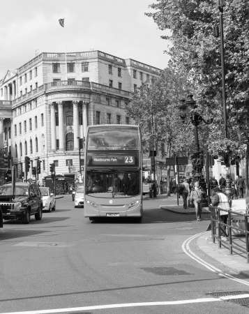 LONDON, UK - JUNE 09, 2015: Red double decker buses are a traditional landmark of London in black and whiteのeditorial素材