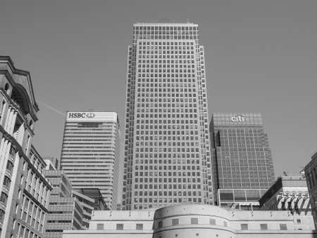 LONDON, UK - JUNE 11, 2015: The Canary Wharf business centre is the largest business district in the United Kingdom in black and whiteのeditorial素材