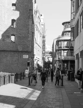 LONDON, UK - JUNE 11, 2015: Tourists in busy central London street in black and whiteのeditorial素材