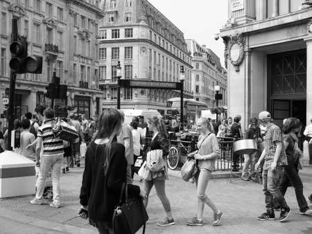 Travellers at Oxford Circus underground station in London, UK in black and whiteのeditorial素材