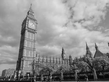 LONDON, UK - JUNE 09, 2015: Tourists in Parliament Square in Westminster in black and white