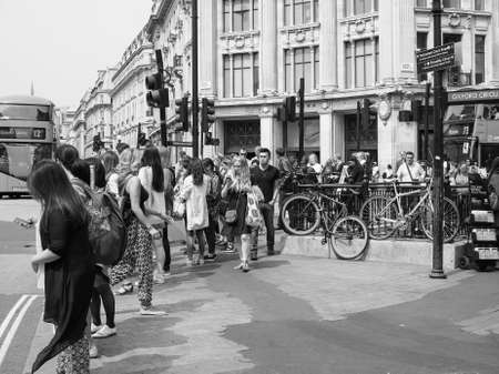 Travellers at Oxford Circus underground station in London, UK in black and whiteのeditorial素材