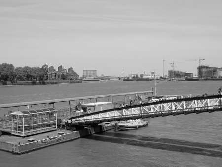 LONDON, UK - JUNE 11, 2015: Greenwich embankment on Thames river in black and whiteのeditorial素材