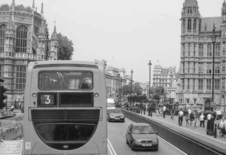LONDON, UK - JUNE 12, 2015: Tourists in Parliament Square in Westminster in black and whiteのeditorial素材