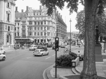LONDON, UK - JUNE 12, 2015: Tourists in Parliament Square in Westminster in black and whiteのeditorial素材