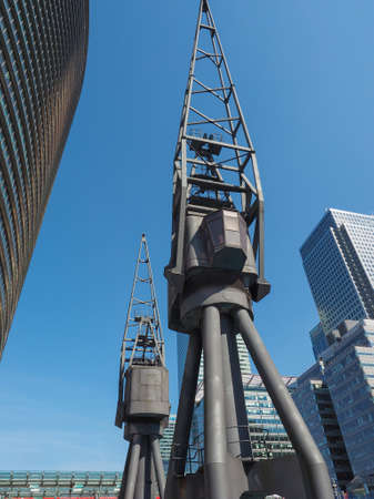 LONDON, UK - JUNE 11, 2015: Docklands harbour craneのeditorial素材