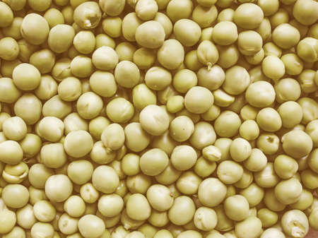 Vintage looking Green peas vegetables useful as a backgroundの写真素材