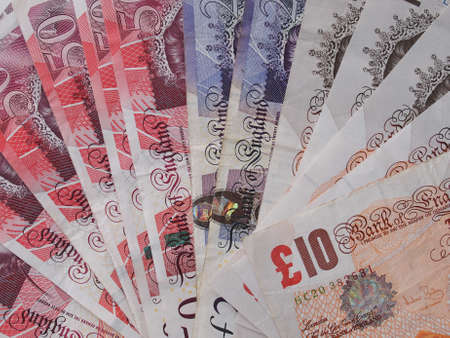 LONDON, UK - SEPTEMBER 05, 2015: British Pound banknotes currency of the United Kingdomのeditorial素材