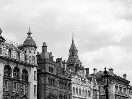 Big Ben at the Houses of Parliament aka Westminster Palace seen from Parliament Street in London, UK in black and whiteの写真素材