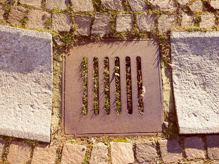 Vintage looking Drain gutter grid for rain water collectionの写真素材