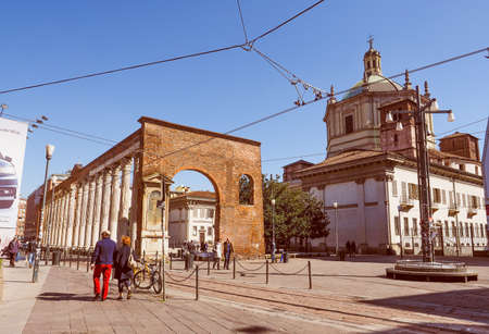 Vintage looking MILAN, ITALY - MARCH 28, 2015: Colonne di San Lorenzo meaning St Lawrence columns, ancient Roman ruins Milan Italyのeditorial素材