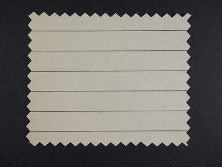 Brown paper swatch with zig zag border cut with pinking shearsの写真素材