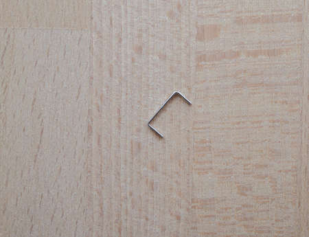 Staples on a wooden table desk in office
