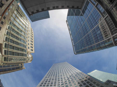 LONDON, UK - SEPTEMBER 29, 2015: The Canary Wharf business centre is the largest business district in the United Kingdom seen with fisheye lensのeditorial素材