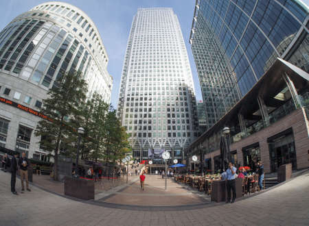 LONDON, UK - SEPTEMBER 29, 2015: The Canary Wharf business centre is the largest business district in the United Kingdom seen with fisheye lensのeditorial素材