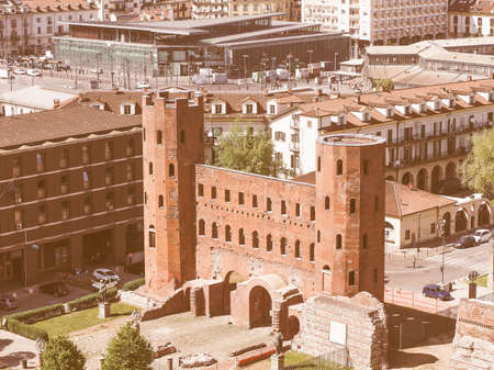 Vintage looking Aerial view of Palatine towers aka Porte Palatine, ruins of ancient roman town gates in Turinのeditorial素材