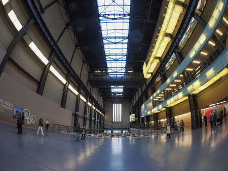 LONDON, UK - SEPTEMBER 28, 2015: The Turbine Hall once housed the electricity generators of the power station now a public space part of Tate Modern art gallery in South Bank seen with fisheye lensのeditorial素材